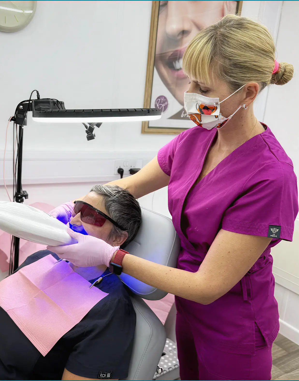 Hanna performing a cosmetic teeth whitening treatment